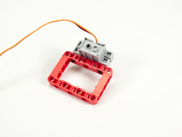 Note that the servo wire should face forward, opposite the frame.