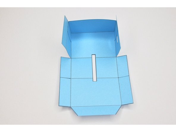 Fold and glue the section of the body WITHOUT the notched tab.