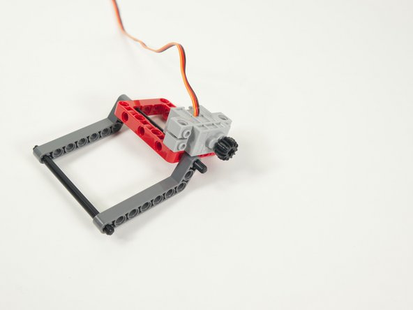 Make sure to press the gear all the way onto the shaft. This ensures it lines up with the other gear we'll add next.