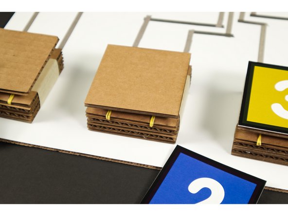 Since we already have a guide for Cardboard Buttons we thought we'd make some to use with our game system.