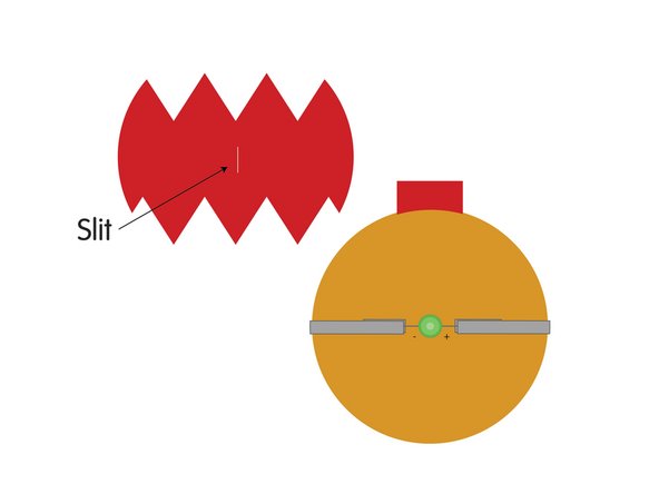Let's add the decoration! To do so you'll need to cut a slit into it so it will fit over the LED.