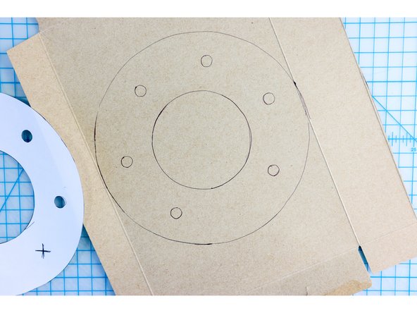 Cut out the shape along the outer and inner circles.