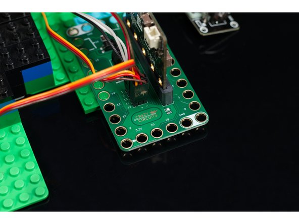 Plug the Y Servo connector into the Pin 14 row. The orange wire goes into Pin 0, the red wire into the + (positive) column, and the brown wire into the - (negative) column.