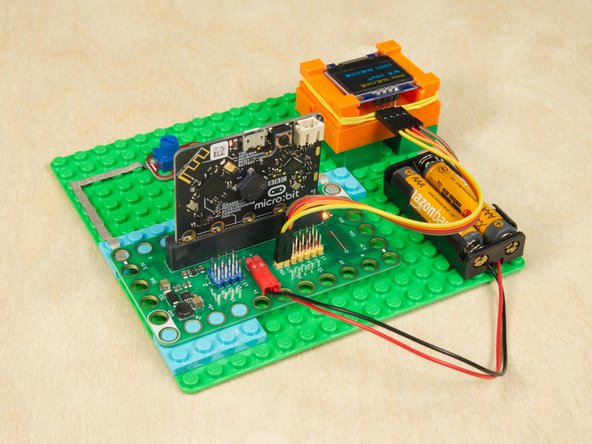 You could connect a Temperature and Humidity Sensor and then display data on the small screen...