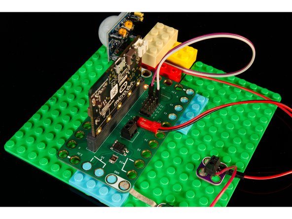 Try standing completely still once you are detected. Does it reset to a single LED as though you are not there? Now move! Did it see you?