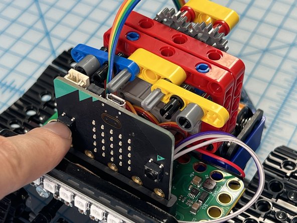 The code is set up so that you can press button &quot;A&quot; to move the arms to the up position and press button &quot;B&quot; to move the arms to the down position. The down position is default.