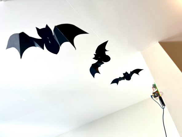 Turn on the battery pack and watch the bats fly!