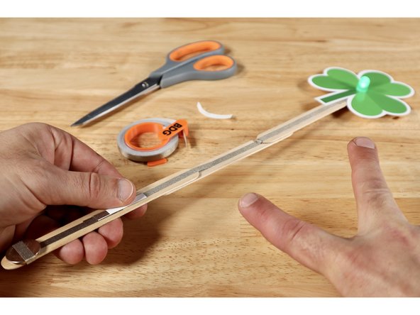 With switch and battery installed, your project is fully operational.  The LED should not light up on its own. When the wand handle is grabbed and the switch is folded down to make contact with the path below, it will turn on. If it does NOT, the battery AND/OR LED legs may be flipped the opposite way.