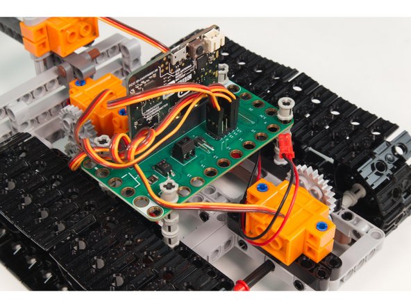 The servo should be plugged into Pin 1. (Your Tank should already have Servos plugged into Pins 13 and 14.)