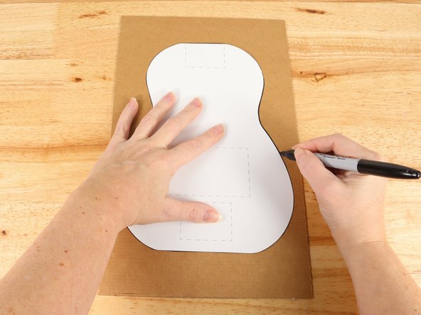 Use the cut template parts to trace the parts onto cardboard.
