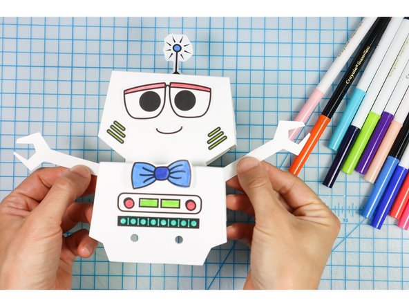 Place them at the angle that you like and then tape them in place. (You may need to trim them shorter so that they don't stick out of the neck.)