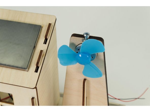 With the windmill in place you can now press the fan blade onto the shaft of the motor.