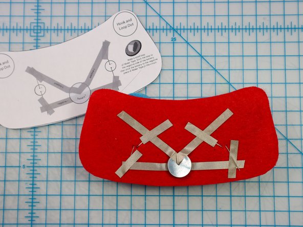 Place a piece of Maker Tape on top of each leg to make a secure connection.