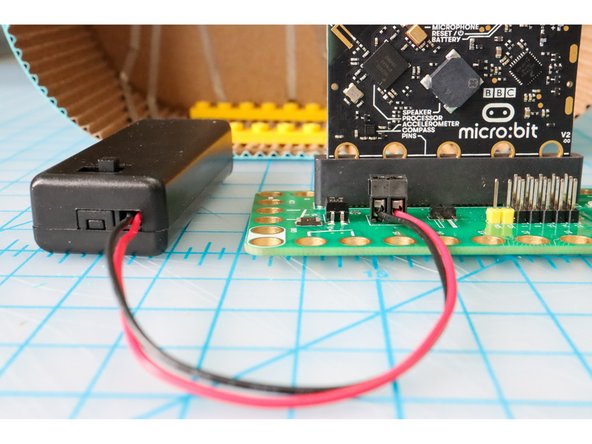 Connect the battery holder to the screw terminals on the Bit Board.