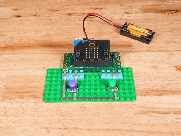 Connect the Positive (+) side of the first LED to Pin 1 on the Bit Board.
