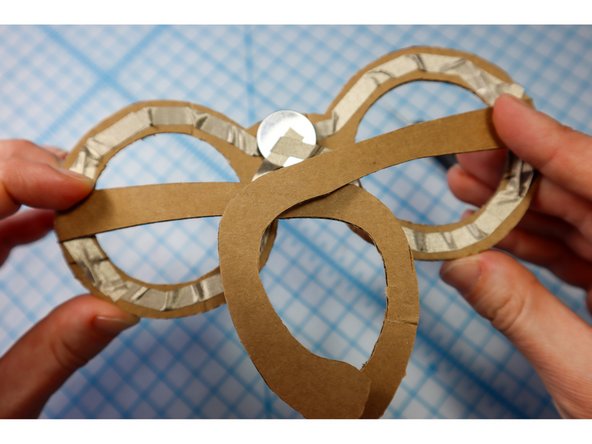 Cut the template to size, trace the new line onto the temples, and cut away the extra material.