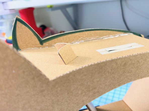 We cut a curve into the top of the wing channel so that it matched the curve of the pig's back.