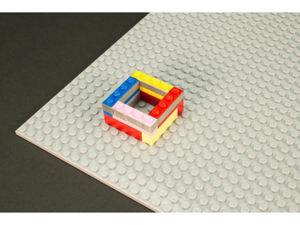 Place the pockets onto the baseplate to match the map.