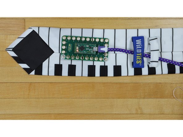 Note: You may or may not want to use some double sided tape to secure down your Invention Board. We did it at this step, you may wish to do it after this step.