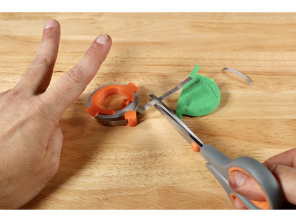 Measure and cut two pieces of Maker Tape that are approximately 2x the length of each of the legs.