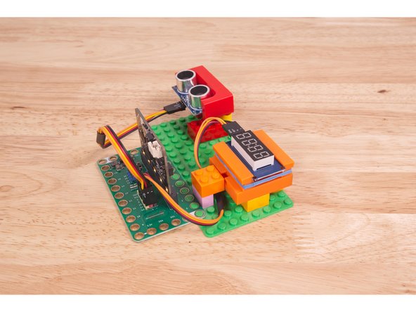A few Technic pins, a Technic beam, and some LEGO bricks are all that is needed.