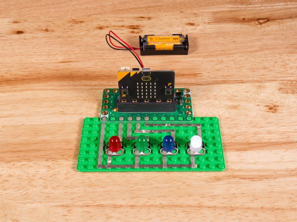 Connect the Positive (+) side of the first LED to Pin 1 on the Bit Board.