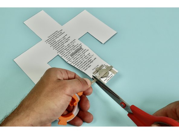 Measure, cut, peel, and stick a piece of Maker Tape down as indicated atop the letter 'F.'