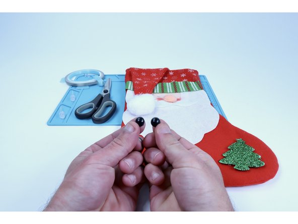 Begin by carefully removing the accents by hand. Cutting them away CAN work but it is also likely to cut the material below it. You will need some solid material in those areas in order to be able to thread the LEDs through the project, holding them in place. Removal by hand is less risky.