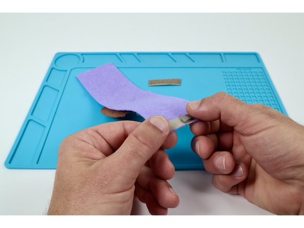 Use the remaining piece of Maker Tape to create a tape loop (sticky-side-out) and stick it in the middle of the edge pad pictured in photo 1.