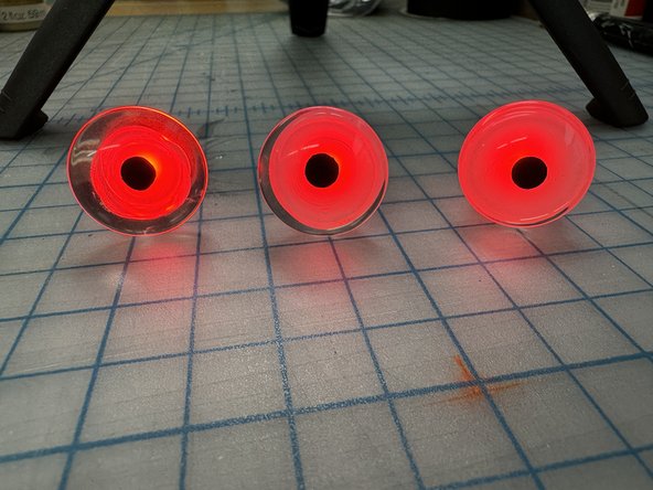 Play with different versions. A small glob of glue makes an eye with a small iris. A large blob illuminates the whole eye!