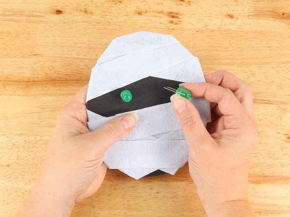 Add the LEDs by pushing the legs through the holes.