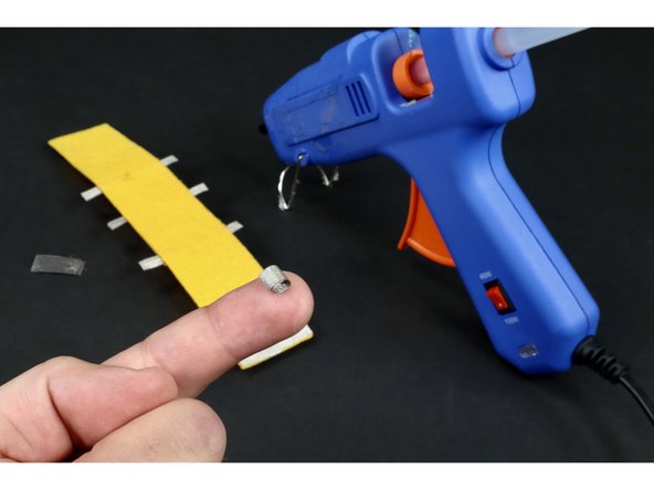 Repeat the previous step to make and place another tape loop on the remaining &quot;pad&quot;.   