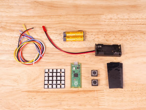 Let's start by looking at the parts we'll need. The crucial components here are the LED matrix, the microcontroller, wire, and the battery pack.
