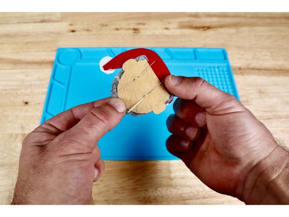 Notice that the LED legs are not the same length. For ease of use with our other instruction sets, thread each LED through a give pair of vertically oriented holes from the front to the back. Take care to orient the LEDs so that the LONG (+) legs are in the UPPER holes and the SHORT (-) legs are in the LOWER holes.