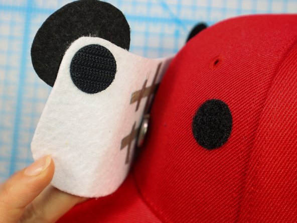 Carefully peel the hook and loop apart and squeeze each dot separately to set the adhesive.