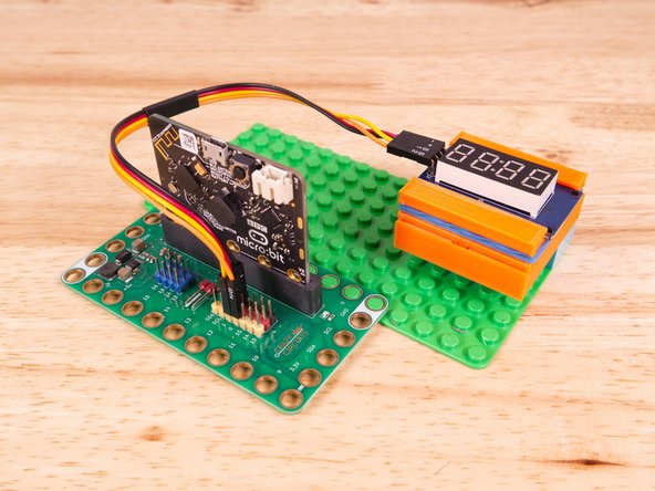 We can then plug the Orange wire labeled S2 into Pin 0 on the Bit Board.