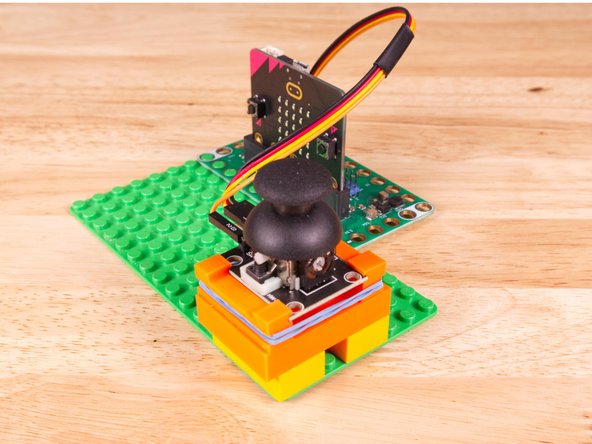 We used a 3D printed part we designed to hold the Thumbstick in place on a LEGO baseplate.