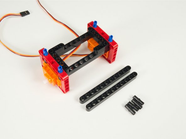 We've got two more long beams to add. These will go on the front.