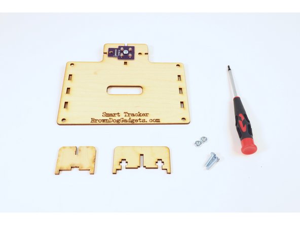 Gather the assembly from the previous step, two (8-32 3/4") screws, two (8-32) nuts, and the two slotted wooden pieces shown.