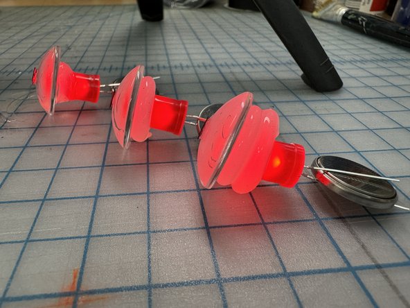 Play with different versions. A small glob of glue makes an eye with a small iris. A large blob illuminates the whole eye!