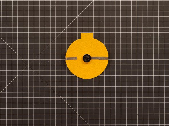 Make sure you stick the negative side of the battery down to the tape loop. The positive side should be facing up and show a + sign on it.