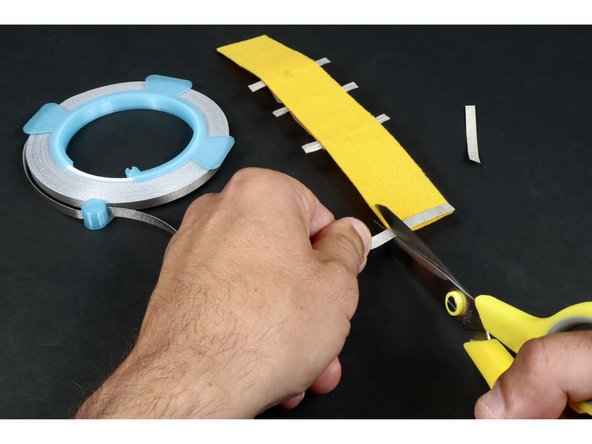 Now you should have three pieces of Maker Tape ready to stick into place: 2 matching small ones and 1 longer.