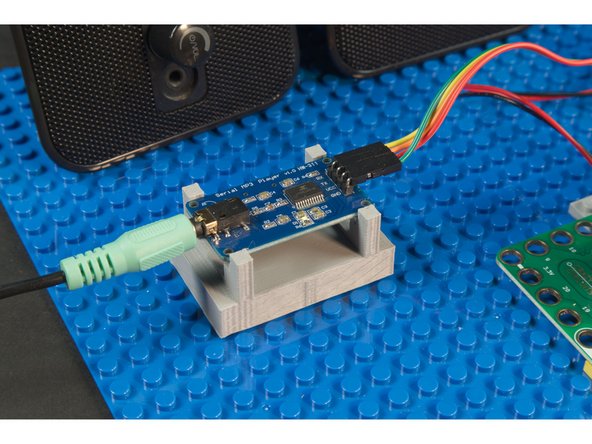 Make sure you've got your SD Card in the audio board, make sure you've speakers plugged into the audio board, turn on your speakers... and press a button!