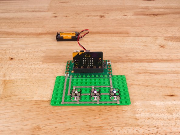 The NeoPixels need to be chained together. You'll notice the labels DI and DO on each one. These stand for Digital Input and Digital Output.