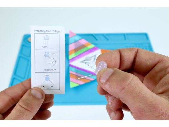 Bend the legs of the LED as shown in photo 3 and the diagram you've clipped and saved. Take care to make these bends so that the LED legs (short and long) are oriented as shown on the  circuit diagram.