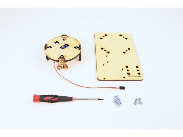 Gather the large engraved base plate and the circular assembly from earlier as well as four (8-32 3/4") screws and four (8-32) nuts.