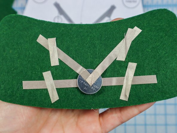 Place a piece of Maker Tape on top of each leg to make a secure connection.