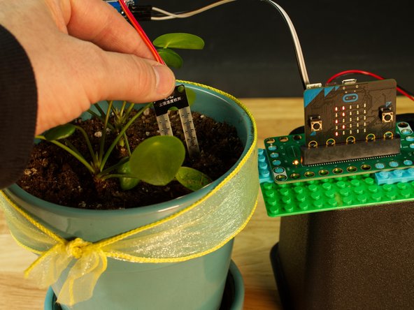 Now that we are seeing readings from the Moisture Sensor, we should insert the probe into some soil!