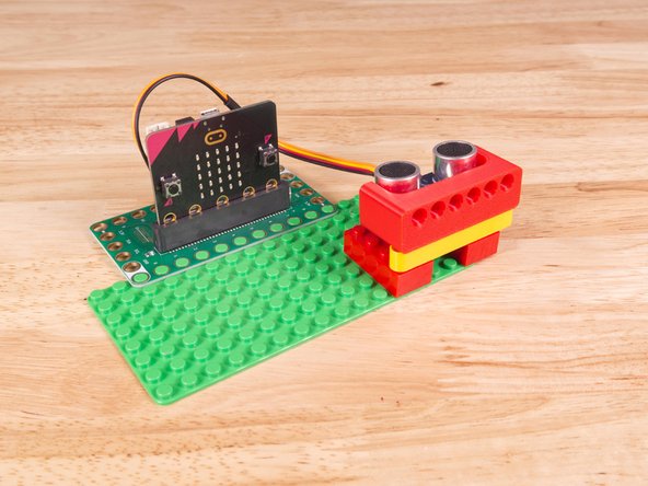 Alternately you can use some LEGO bricks and a rubber band or tape to hold the sensor in place. (But don't use anything conductive!)