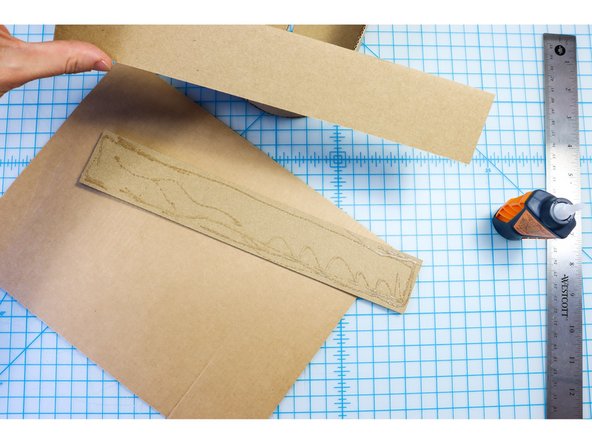 Glue the two neck pieces together to make them more sturdy.